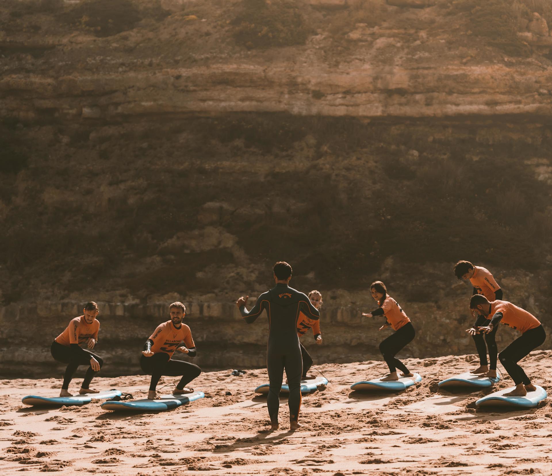 Surf instructor giving lessons in Ericeira