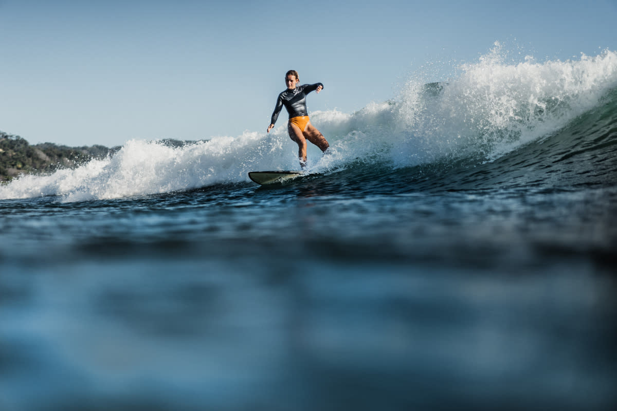Girl surfing in Costa Rica