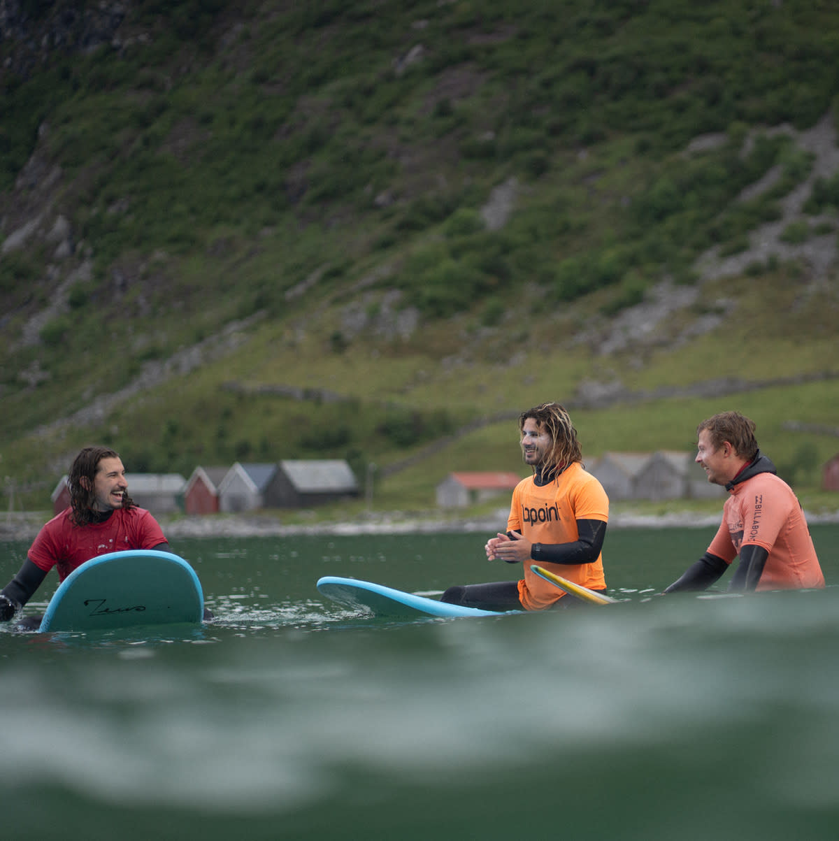 HG4-guys-surfing-and-smiling-at-hoddevik-lapoint-surf-camp