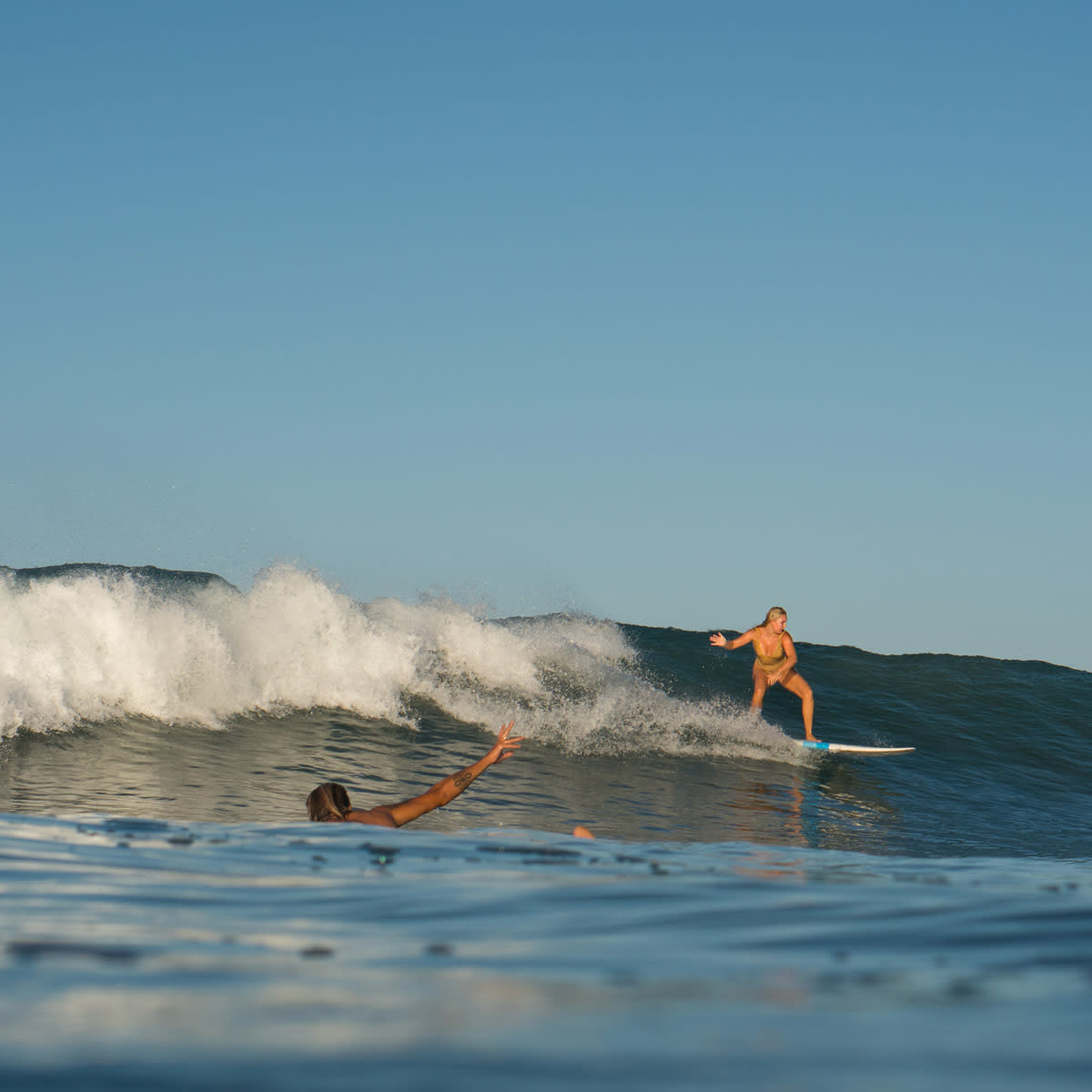 Woman-surfing-in-Costa-Rica-lapoint-surf-camp