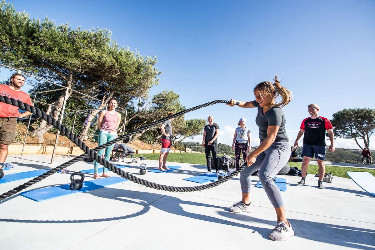 Training at outdoor gym at Lapoint Surf camp Ericeira Portugal