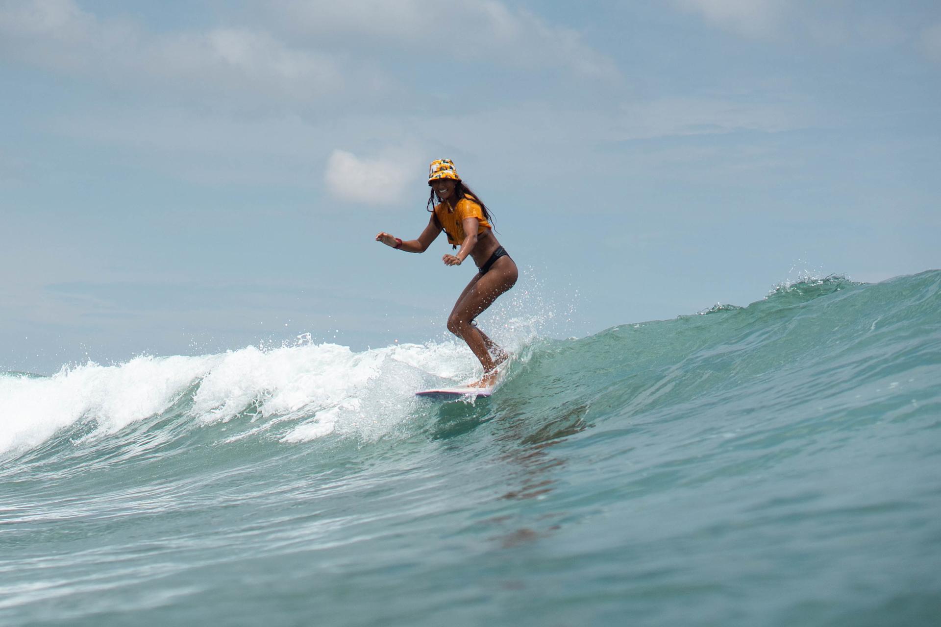 Girl surfing at Old Man's