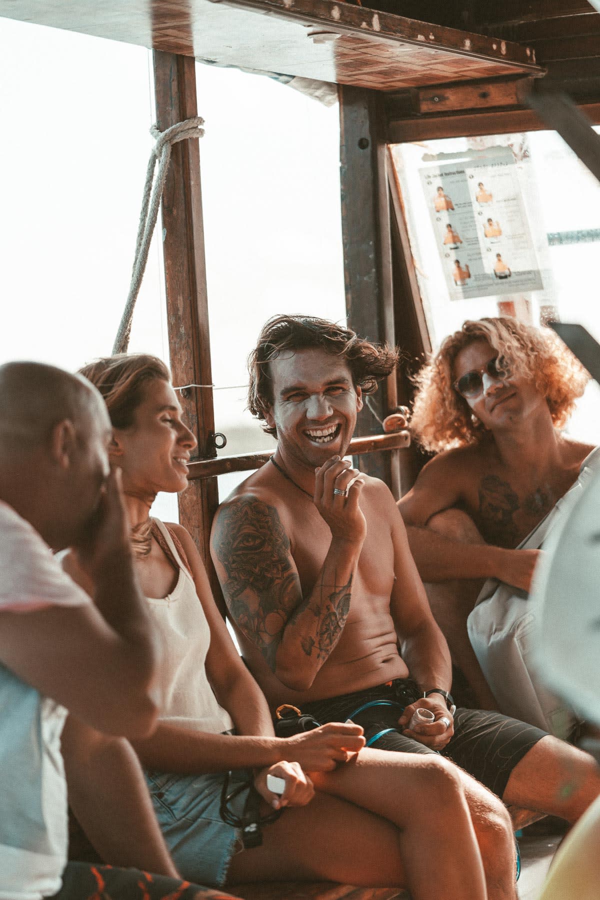 People on surf boat at daytime LAPOINT MALDIVES