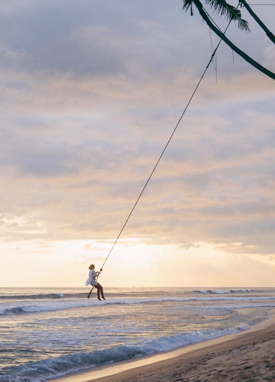 Girl swinging in Sri Lanka