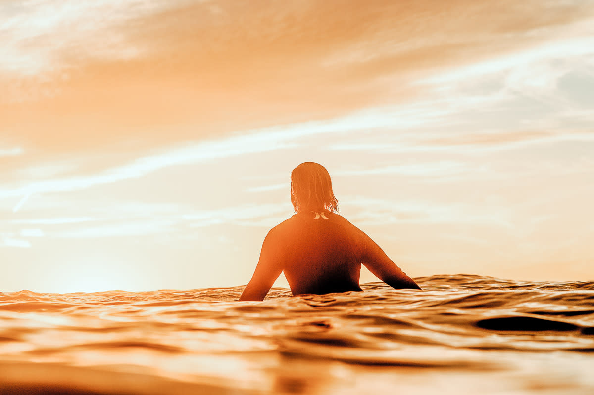 waiting for waves in sunset