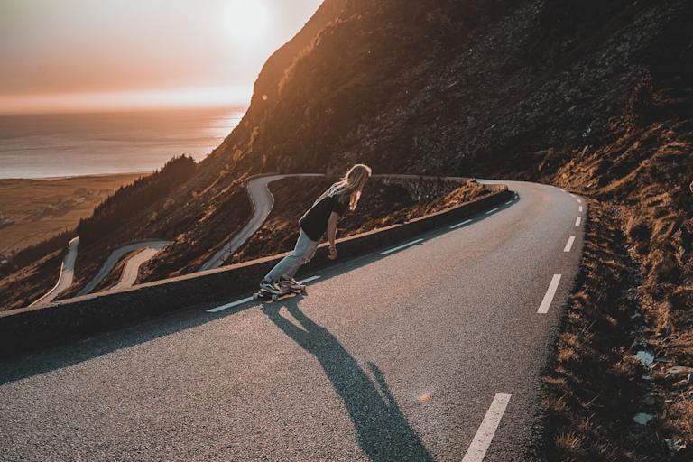longboard-sunset-hoddevikroad