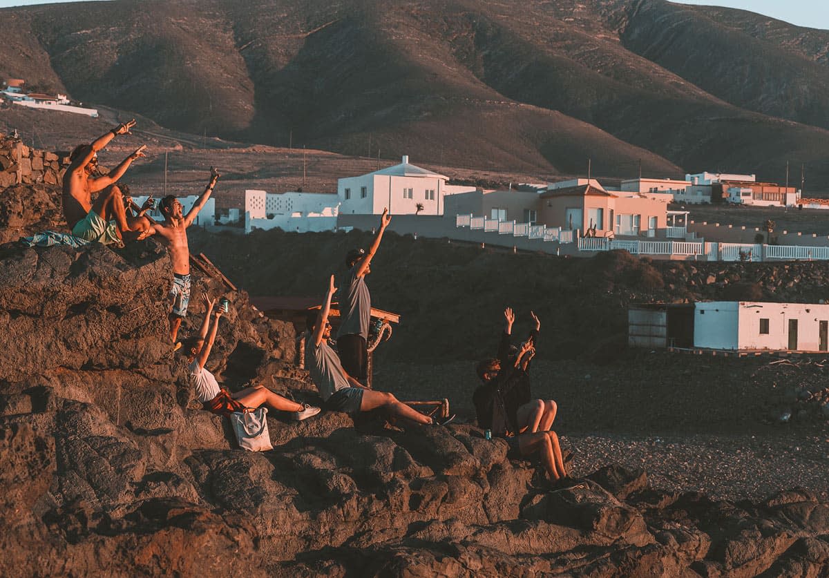 Friends in rock pool in Fuerteventura